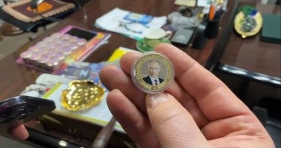 Талисман Мирхайдарова - монета с изображением президента РФ