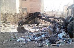 «Вечорка» заставила коммунальщиков убрать помойку на улице Журавлева