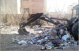 «Вечорка» заставила коммунальщиков убрать помойку на улице Журавлева